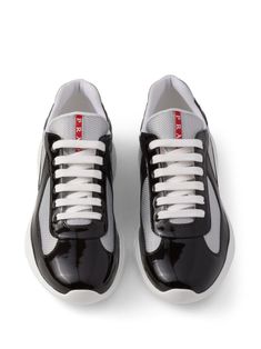 Find PRADA America's Cup Logo-patch Sneakers on Editorialist. black/grey leather patent finish mesh panelling logo patch at the tongue round toe front lace-up fastening branded insole chunky rubber sole Prada Sneakers, Cup Logo, Sneakers Multicolor, America's Cup, Americas Cup, Brown Sneakers, Prada Men, Grey Leather, Sneakers Black