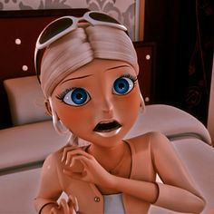 an animated woman with big blue eyes sitting on a bed