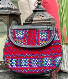 Beautiful and colorful One of a kind huipil crossbody bag made by Guatemalan artisan women.  Wear a bag that is unique as you are! very convenient to carry small items like cellphone, wallet, keys and more. *adjustable strap *2 extra  smaller pockets *Leather Visit shop to see other color options! Disclaimer: Due to the nature of the product imperfections are expected and appreciated. Bohemian Shoulder Bag With Cell Phone Pocket As Gift, Artisan Multicolor Clutch Bag, Fair Trade Multicolor Shoulder Bag For Everyday Use, Festival Shoulder Bag With Cell Phone Pocket, Traditional Crossbody Shoulder Bag For Daily Use, Multicolor Fair Trade Shoulder Bag For Everyday Use, Traditional Travel Shoulder Bag, Traditional Handwoven Crossbody Shoulder Bag, Traditional Fair Trade Shoulder Bag For Travel