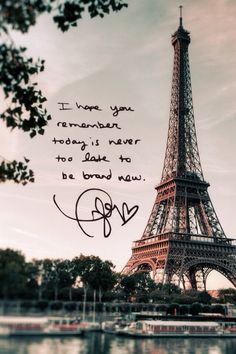 the eiffel tower is shown with an autographed photo on it's screen