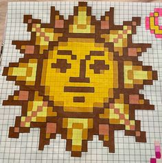 a piece of art made to look like a sun face on a sheet of paper