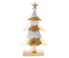 a gold and silver christmas tree on a white background with a star in the top