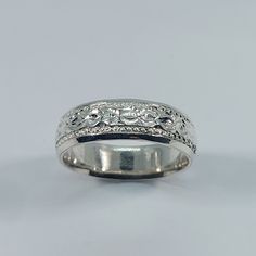 This stunning handmade/hand engraved unisex/any occasion band has been carefully crafted in solid 925 sterling silver. This beautiful band will not go unnoticed. Ring is size 9 but can be resized at no extra cost. A personalized message can be added to the inside of the ring such as your special date or any other message. All of my jewelry is handmade from scratch, one item at a time, as I like to produce a high quality piece. Ring will be shipped to you in an elegant gift box. A tracking shippi Classic Silver Engraved Ring For Ceremonial Occasions, Ceremonial Sterling Silver Engraved Ring, Ceremonial Engraved Sterling Silver Ring, Classic Sterling Silver Engraved Ring For Ceremonial Occasions, Ceremonial Sterling Silver Engraved Ring Stamped 925, Ceremonial Sterling Silver Engraved Ring With Polished Finish, Sterling Silver Wide Band With Polished Finish, Wide Band Sterling Silver With Polished Finish, Anniversary Band Engraved Ring