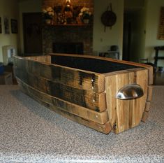 a wooden box sitting on top of a counter