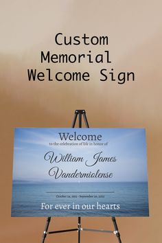 a welcome sign is displayed in front of an easel