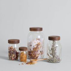 jars filled with different types of herbs and spices