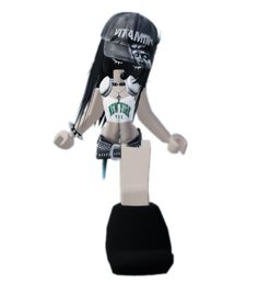 a white and black bobble head with a hockey helmet on it's head