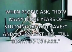 a skeleton sitting on top of a table next to a book with the caption when people ask, how many more years of studying do you have? and you just like