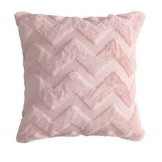 a pink pillow with a chevroned pattern on the front and back, sitting on a white background