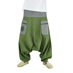 Genie pants Stampfgewand

Looking for the perfect festival outfit that combines comfort and style? Look no further than the Stampfgewand harem pants from virblatt! Available in a beautiful combination of green and grey, these unisex pants are designed to suit both men and women, and are sure to make you stand out from the crowd.

Crafted with care, these pants feature a comfortable elastic waistband with drawstrings that ensure a snug and secure fit. The addition of zip pockets and regular pocke Baja Jacket, Embroidered Mandala, Hippie Mode, Genie Pants, Moda Hippie, Clean Fashion, Mode Hippie, Harem Shorts, Drop Crotch Pants