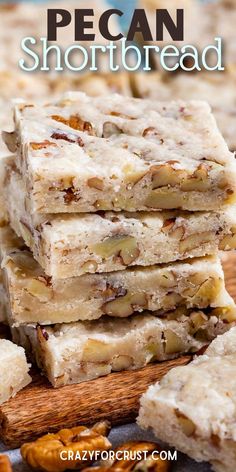 pecan shortbread is stacked on top of each other with nuts and cinnamon in the background