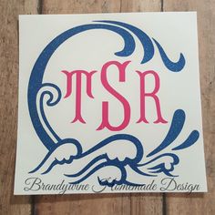 the tsr logo is displayed on a wooden surface