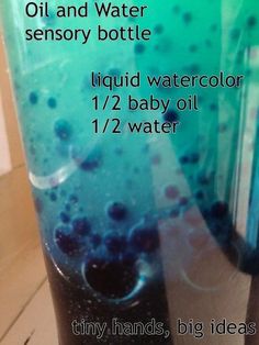 an image of a bottle with blue liquid in it