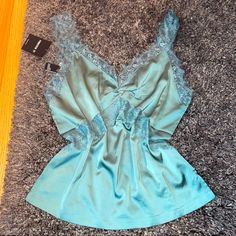 Nwt Forever 21 Lingerie Top Satin And Lace Teal Color Size Small But Can Fit A Medium Loose Fit I’m Having A Limited Time Deal!! Bundle 3 Items From My Closet That Will Are $12 Or Less For Just $20! Don’t Wait,Supplies Going Fast! Feel Free To Send Offers! Bundle And Save %15 On Bundles Of 2 Or More!! Each Package Is Wrapped And Shipped With Love, And A Thank You Card With Free Stickers! I Appreciate All Of My Customers. If You Would Like To See More Pictures, Please Comment Down Below! I Am A 5 Summer Sleepwear By Forever 21, Forever 21 Summer Sleepwear, Summer Sleepwear From Forever 21, Blue Camisole Top For Night, Forever 21 Camisole For Night Out, Forever 21 Summer Sleepwear For Loungewear, Forever 21 Sleepwear For Summer Loungewear, Forever 21 Summer Loungewear Sleepwear, Forever 21 Pajamas