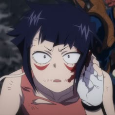 an anime character with black hair and blue eyes talking on a cell phone in front of other characters