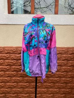 The item is in great condition Purple Long Sleeve 90s Outerwear, 90s Style Purple Long Sleeve Outerwear, 90s Style Long Sleeve Purple Outerwear, Vintage Fitted Long Sleeve Windbreaker, Fitted Blue Winter Windbreaker, Fitted Blue Windbreaker For Winter, Blue Fitted Casual Windbreaker, Acrylic Brooch, Spring Jacket