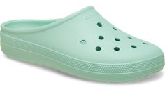 Featuring more feminine styling, this new clog offers a sleek and modern update of our Classic Clog for everyday wear. Inspired by sporty minimalism, the Classic Low Profile Clog offers versatile style and comfort in a low profile design. You’ll enjoy a newly developed fit and updated outsole combined with the Crocs comfort you know and love. And it’s customizable with Jibbitz™ charms, making it easy to show off your unique personality.  Classic Low Profile Clog Details:    Stylish low profile d Sporty Clogs With Arch Support, Casual Clogs With Arch Support For Spring, Casual Green Slip-resistant Clogs, Spring Waterproof Synthetic Clogs, Slip-resistant Casual Clogs In Solid Color, Sporty Non-slip Clogs For Spring, Sporty Synthetic Spring Clogs, Sporty Synthetic Clogs For Spring, Casual Slip-resistant Clogs