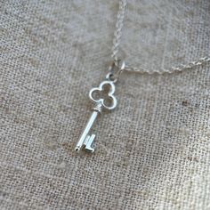 This is such a sweet little refurbished vintage sterling silver key pendant.  The key has a little initial 'L' on it. I have a few different letters and hearts so please check my other listings too.  A great little pendant to layer up. There are also a choice of chain lengths. Please choose from the drop down menu.  This item comes well packaged in a branded box and would make a lovely gift. A gift message can also be added upon request.  Returns policy -  If you would like to make a return, ple Silver Necklace With Two Keys For Gift, Silver Pendant Necklace With Two Keys, L Initial, Elegant Sterling Silver Key Necklace, Initial L, Nickel-free Sterling Silver Initial Pendant Charm Necklace, Silver Key Necklace, Silver Key, Key Pendant