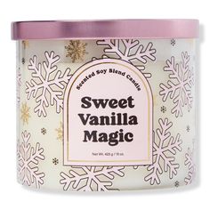 sweet vanilla magic candle in a tin with snowflakes on the front and pink lid