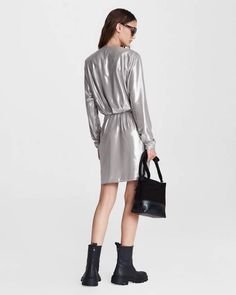 Meet Eloise, the slinky mini dress for every upcoming party and dinner date this season. Cut in a slim fit and a mini length that hits at the mid-thigh, with a draped deep-v neckline for added drama. Done in three occasion-ready colors. rag & bone Women's Viscose Eloise Metallic Mini Dress | Silver Grey, 14. Chic Draped V-neck Evening Dress, Chic V-neck Dress For Holiday Party, Glamorous Draped Mini Dress For Date Night, Knee-length Wrap Dress For Party, Ruched Mini Dress With Surplice Neckline For Night Out, Chic Draped Mini Dress For Cocktail, Chic Draped Mini Dress For Cocktail Parties, Ruched Surplice Neckline Mini Dress For Night Out, Sleek V-neck Mini Dress For Date Night