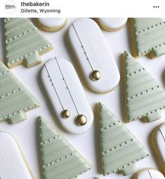 cookies decorated with green and white icing are arranged in the shape of christmas trees