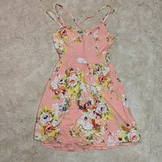 Light Pink Floral Dress, Size 5, From Charlotte Russe. Double Adjustable Spaghetti Straps, Where One Set Crosses The Back. One Layer Of Crinoline Type Material To Help The Skirt Keep It's Slightly Poofed Shape. Creates A Fantastic Hourglass Shape. Zips Up The Back. Brand New, Never Worn, But Tags Removed And Wrinkly From Closet. No Wear, Tear, Stains, Etc. Just Needs A Good Steaming. Casual Sundress With Adjustable Straps For Garden Party, Pink Floral Sundress With Spaghetti Straps, Casual Mini Dress With Adjustable Straps For Garden Party, Casual Summer Floral Dress With Adjustable Straps, Spring Beach Sundress With Spaghetti Straps, Casual Floral Print Sundress With Spaghetti Straps, Casual Sundress With Spaghetti Straps For Spring, Casual Floral Sundress With Spaghetti Straps, Casual Floral Beach Dress With Spaghetti Straps