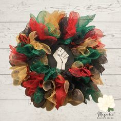 a wreath with a fist drawn on it