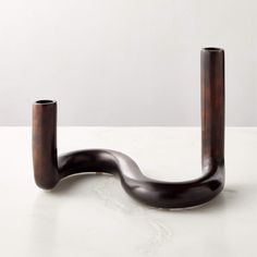 a couple of pipes sitting on top of a white counter