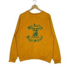 PLEASE ASK ANY QUESTION BEFORE BUYING THIS IS USED CLOTHING PLEASE DONT EXPECTED IT TO BE LIKE NEW OR IN PRISTINE CONDITION 80s MCAULEY HIGH SCHOOL SWEATSHIRT CREWNECK tag Missing material Cotton 50% Polyester 50% saiz on tag M (Medium) Mesasures About ( Approximately) -Armpit to Ampit : update inch -Length (back collar down) : update inch Condition : used good condition 8/10 **No Tears No Stains And No Hole** 🎈PLEASE READ THE DESCRIPTION AND POLICY BEFORE BUYING 🎈ACCEPT PAYMENT: PAYPAL ONLY A Vintage Sports Tops For Fall, Retro Long Sleeve Tops For School, Vintage Crew Neck Tops For School, Vintage Fall School Tops, Vintage School Sweatshirts, Retro College Sweatshirt With Screen Print, Vintage Fall Sports Sweatshirt, Retro College Screen Print Sweatshirt, Yellow Crew Neck Sweatshirt For College