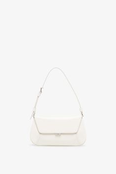 White leather bag from Amina Muaddi. The Ami mini bag is made of calf leather with silver finish hardware, a magnetic closure along with an inside mirror frame. It features an internal flat pocket and is complete with an adjustable strap.Measurements: L21 x H12 x W4 cmMade in Italy White Leather Bag, Amina Muaddi, Mirror Frame, Magnetic Closure, White Leather, Mini Bag, Calf Leather, Leather Bag, Adjustable Straps