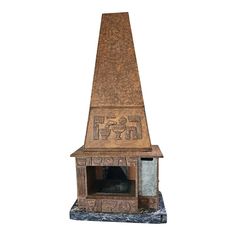 a small fireplace with an egyptian writing on the top and bottom part, in front of a white background