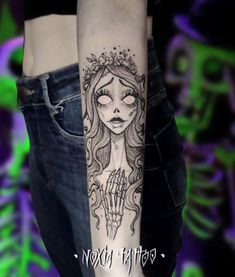 a woman's arm with a tattoo on it