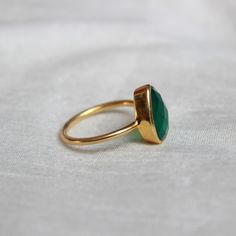 D E T A I L S - Material: Sterling Silver 925 Stone: Green Onyx The fit: True to US ring size Finish: wired design finish and gold-filled to a high shine Upgrade your accessory collection today with this must-have piece, & flaunt your style statement. S H I P P I N G & P R O D U C T I O N - My current production time is 2-6 business days, which means after those days are up, your order ships! I make everything custom to order, by hand, but I promise you it's worth the wait! R U S H - M Y Classic Adjustable Emerald Ring, Adjustable Emerald Ring With Bezel Setting, Emerald Faceted Ring As A Gift, Faceted Emerald Ring As A Gift, Faceted Rings For Gifts, May Birthstone, Faceted Rings For May Birthstone Gifts, Faceted Ring Gift For May Birthstone, Ring Everyday, Ring Proposal