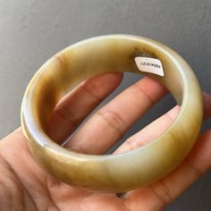 Gorgeous New Light Beige Jade Bangle Bracelet What An Amazing Bracelet! New Red Earthy Hues Thick Bangle Very Heavyset 92g 55mm Inner Diameter, Fits An Average Wrist It Looks Simply Amazing! Natural Undyed With Natural Blemishes, Makes It Natural! This Is An Amazing Find!! Rare, Only One In The World. Looks So Great In Each Of The Different Lights. New Unworn Pet Smoke Free Shop Check Out My Solid Gold, Sterling Silver. Unique Bangle With Polished Finish, Unique Round Bangle With Polished Finish, Formal Bangle Bracelet With Natural Stones, Handmade Formal Round Bangle, Handmade Formal Bangle, Jade Bangle Bracelet, Earthy Hues, Jade Bangle, Different Light