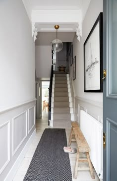 the hallway is clean and ready for us to use as an entrance way in this house