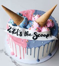 a cake with ice cream and sprinkles on it that says eat the scoop