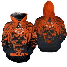 an orange and black hoodie with skulls on it