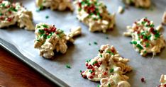 cookies with sprinkles are on a baking sheet