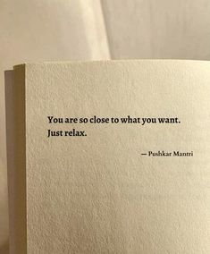 an open book with the words you are so close to what you want just relax