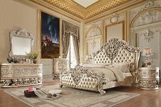 an ornately decorated bedroom with white furniture