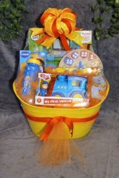 a yellow basket filled with lots of toys