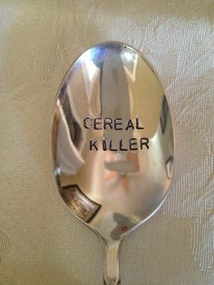 a spoon with the words cereal killer written on it