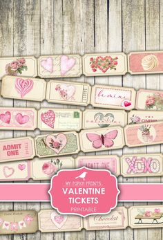 valentine's day tags with pink flowers and hearts on them are displayed against a wooden background