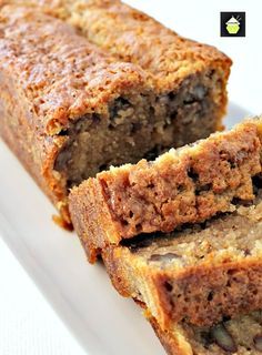 two slices of banana bread on a white plate