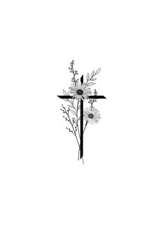 a cross with flowers and leaves on it