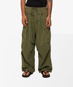 Welcome to the world of KAPITAL, a brand that combines traditional Japanese aesthetics with contemporary designs to create unique fashion pieces that stand out.Introducing the Rip Stop Jumbo Cargo Pants for Spring Summer 2024. These verde cargo pants are a must-have for any man's wardrobe, offering both style and functionality in one. Get your hands on these stylish pants only at SVD. Pants Verde, Cargo Pants Green, Pants Green, Stylish Pants, Style Savvy, Spring Summer 2024, Bank Card, Cargo Pant, Cargo Pants Men