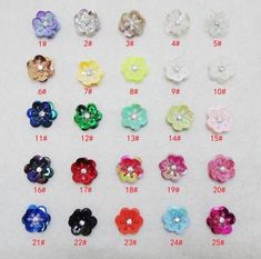 various colors and sizes of flower hair clips