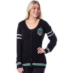 Show off your support for the slickest house in all of Hogwarts with this cozy button-down cardigan featuring the Slytherin crest! The relaxed, retro varsity style will have you feeling just like you're a student receiving lessons from Professor Severus Snape. The front of the cardigan features a high-quality embroidered Slytherin house crest logo. The sleeves have a double grey stripe design, and the sleeve cuffs and bottom hem have a green and grey stripe pattern to match the Slytherin house c Slytherin House Crest, Harry Potter Sweater, Slytherin Crest, Professor Severus Snape, Varsity Sweater, Slytherin House, Crest Logo, Embroidered Cardigan, Severus Snape