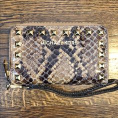 Michael Kors Wristlet Wallet Card Holder. New Without Tags Or Box. Never Used. This Gorgeous Bag Features Beautiful Snakeskin Leather And Gold Hardware With Studs. Michael Kors Clutch Wallet With Card Slots, Michael Kors Brown Wallet With Zipper Closure, Michael Kors Brown Wallets With Zipper Closure, Brown Michael Kors Wallet With Zipper Closure, Michael Kors Brown Wallet With Removable Pouch, Mk Wallet, Gold Wallet, Michael Kors Wristlet, Girl With Sunglasses