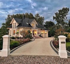 a large house with a driveway leading to it